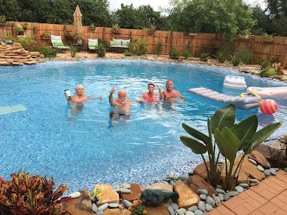 Logo of Dolphin Pools & Spas LLC