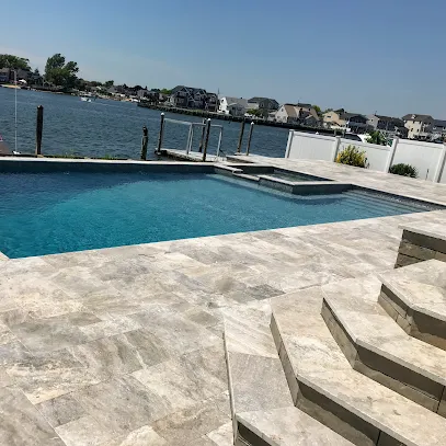 Logo of John Joseph Custom Pools & Masonry