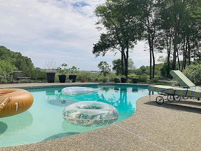 Logo of Neptune Pools and Spas Inc.