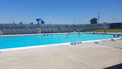 Logo of Sunset Swim Center