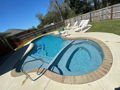 Logo of Vaughns Pools - San Juan Pools