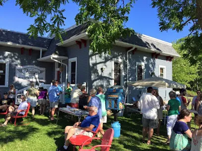 Logo of Vintage Elkhart Lake - Wine Shop & Fine Foods