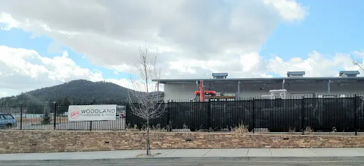 Logo of Woodland Hardware and Home